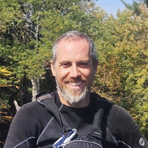 <b>Phil Ouell</b><br>Directeur général, conducteur d’autobus, surintendant, barman